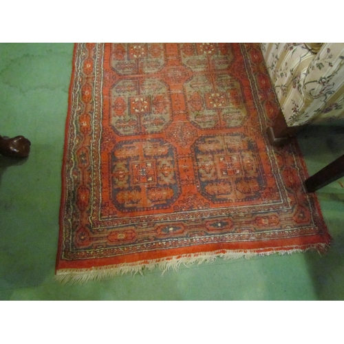 4111 - A late 19th / early 20th Century Turkman geometric design runner rug, red ground with multiple borde... 