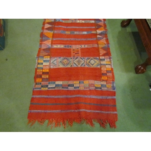 4157 - A red Kilim rug, 178cm x 76cm