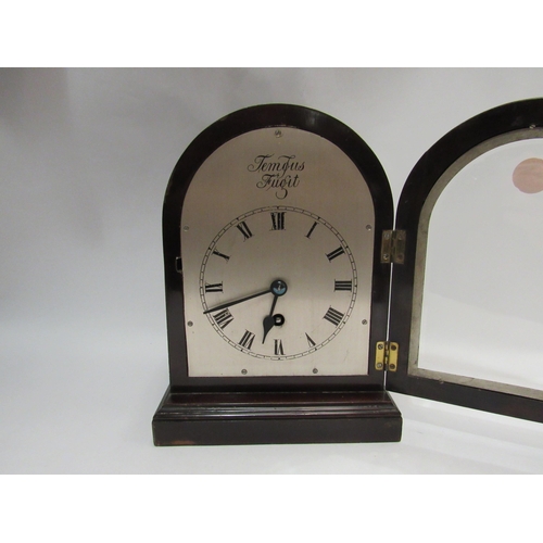 4362 - A Tempus Fugit mantel clock and an embossed brass charger, 45cm diameter