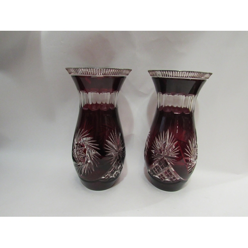 4363 - Two large cranberry cut glass vases, 30cm tall, and a bowl, a/f