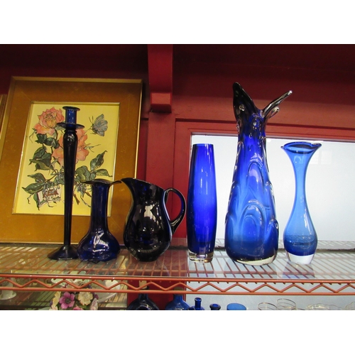 4382 - Six pieces of blue glassware including vases, jug, etc