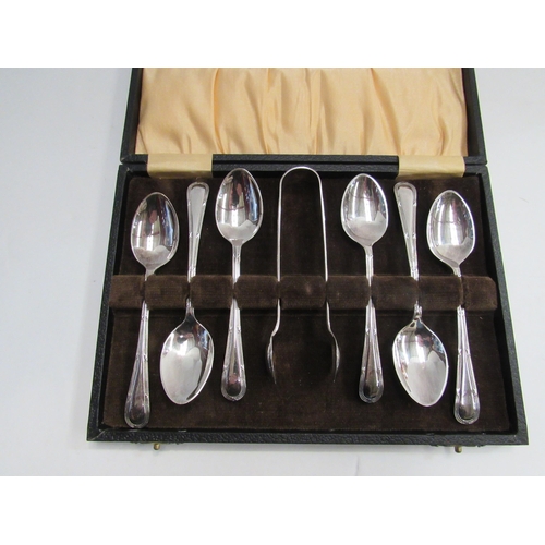 4388 - A quantity of plated ware tea wares, a silver back mirror marked Birmingham and a silver chamber sti... 