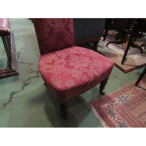 4167 - A circa 1850 mahogany prie-dieu chair with pink patterned upholstery over turned and tapering legs o... 