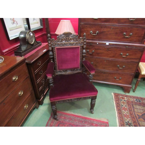 4172 - A Victorian carved oak throne style chair, scrolled foliate frame, velour upholstery, on fluted and ... 