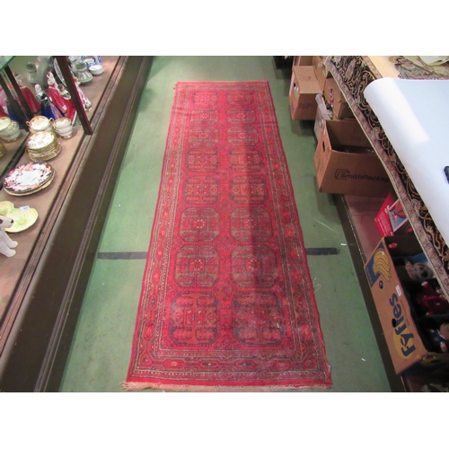 4190 - A late 19th / early 20th Century Turkman runner rug, red ground with multiple borders, 266cm long x ... 