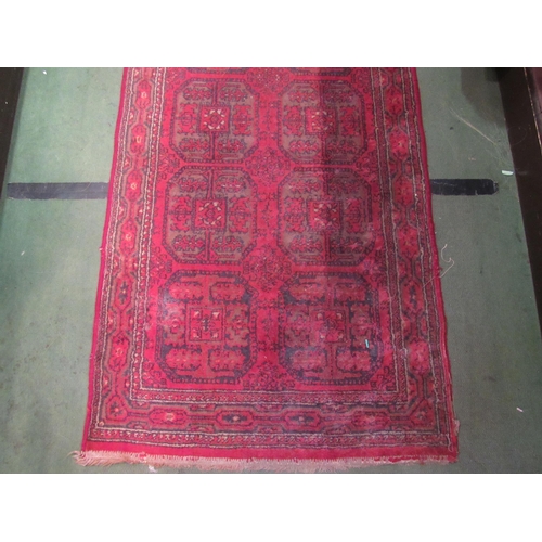 4190 - A late 19th / early 20th Century Turkman runner rug, red ground with multiple borders, 266cm long x ... 