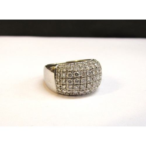 8296 - A white gold diamond Bombe ring. Size O/P, 11.2g   (R) £500