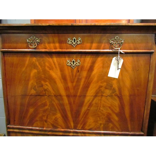 1052 - A 19th Century flame mahogany escritoire, the slim drawer over a fall-front opening to reveal a fitt... 