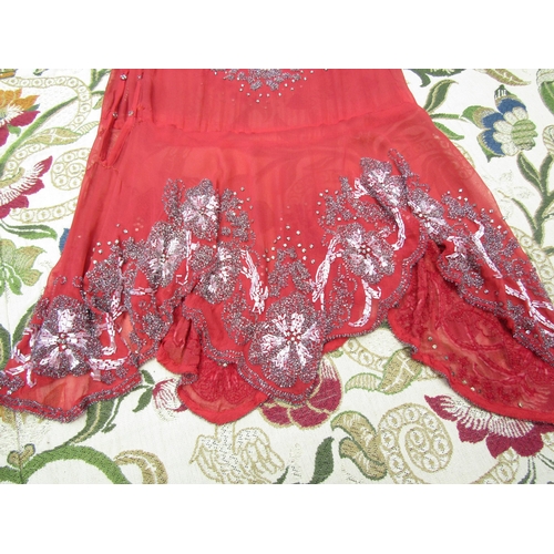 1054 - Two 1920's/30's evening tops in coral and black, both are silk chiffon and decorated with silvered a... 