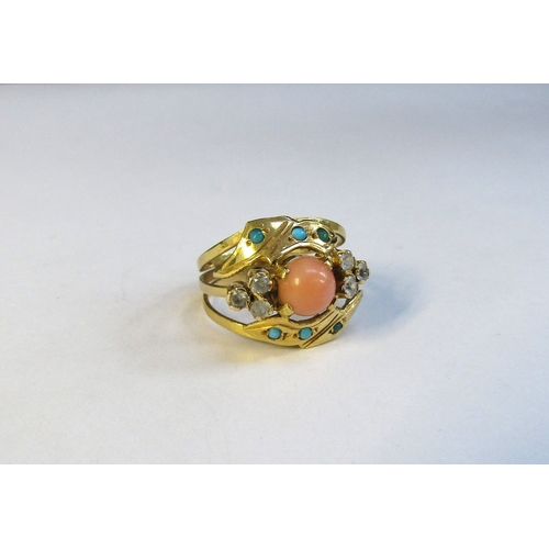 8310 - A gold ring centrally set with a coral cabochon framed with turquoise and clear stones. Size L/M, 3.... 