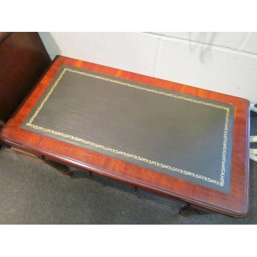 1029 - A Victorian mahogany hall table with later tooled leather top and two drawers, 72cm tall x 92cm wide... 