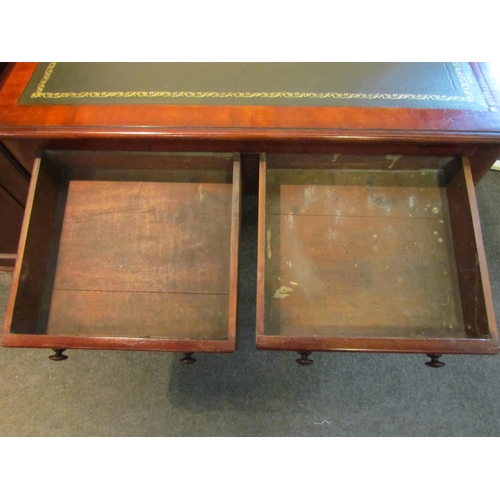 1029 - A Victorian mahogany hall table with later tooled leather top and two drawers, 72cm tall x 92cm wide... 