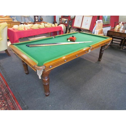 1136 - An E.J Riley Ltd. three quarter size slate based snooker / dining table with five leaves, model A718... 