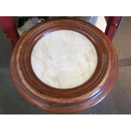 1137 - A Victorian mahogany cylinder pot cupboard with marble top, 71cm tall x 40cm diameter