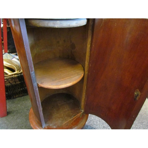 1137 - A Victorian mahogany cylinder pot cupboard with marble top, 71cm tall x 40cm diameter