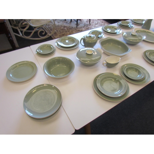 1138 - Approximately 50 pieces of retro Poole dinner wares including plates of varying sizes, lidded tureen... 