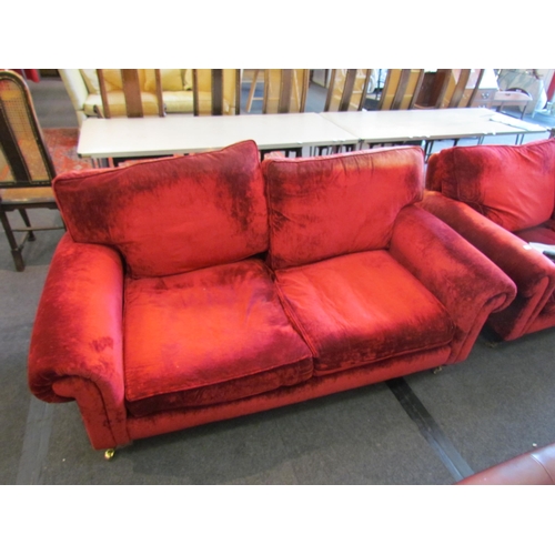 1150 - A rich red velvet upholstered deep-seated two seater settee   (E) £30-50