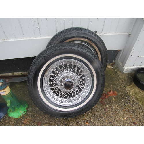 9001 - Two Jaguar E-Type wire spoke wheels with tyres, one has been re-chromed