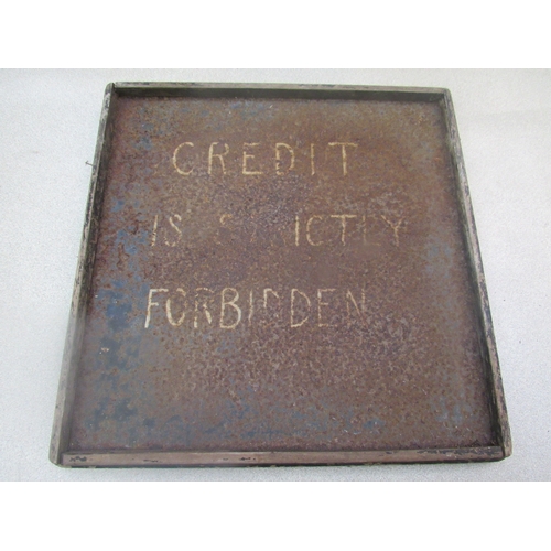 9031 - A hand written 'Credit is strictly forbidden' tin garage sign. 44cm x 43cm