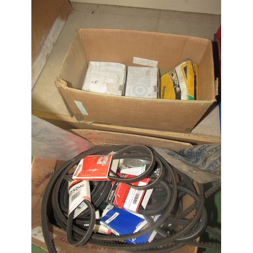 9072 - A box of new old stock belts and brake shoes