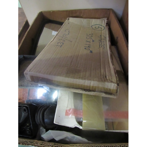 9074 - A box of new old stock mirrors
