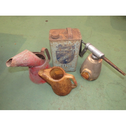 9113 - A Royal Snowdrift antifreeze can, two oil jugs and a Shell upper cylindar lubricator
