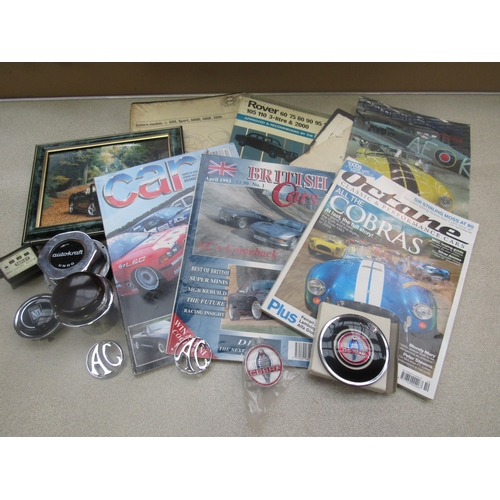 9119 - A box containing a 1973 Haynes manual for Fiat 500, sport, 500D, 500F and 500L. AC chromed badges an... 