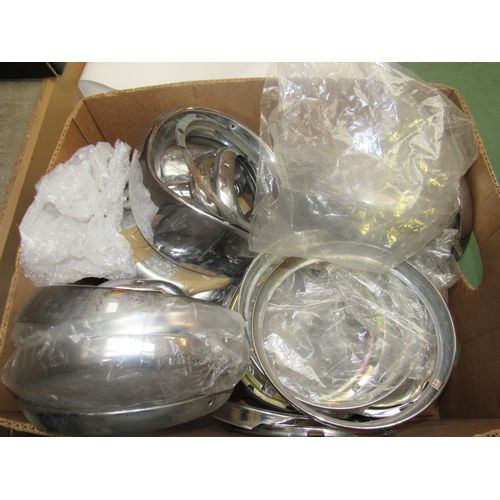 9150 - A box of mixed chromed head lamp rims, etc