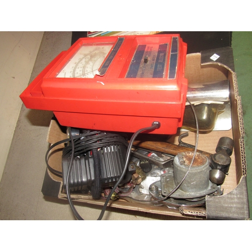 9151 - A box of mixed including chromed filler caps, battery charger, a mini compressor and two steering wh... 