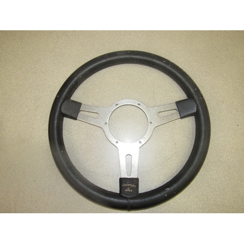 9156A - A Motec steering wheel and another