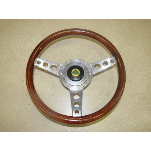 9157 - A wooden rim and chrome Astrah Lotus steering wheel