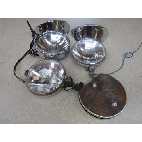 9193 - Two chromed Lumax lamps, two chromed shields, a chromed Butlers lamp and a chromed Webber fitter