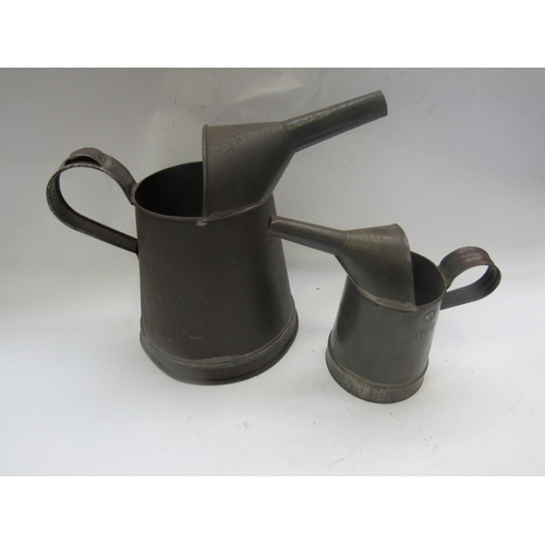 9197 - Two oil jugs with lead stamps     (C)