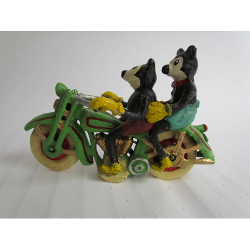 9206 - A cast reproduction figurine of Mickey and Mini Mouse riding a motorcycle