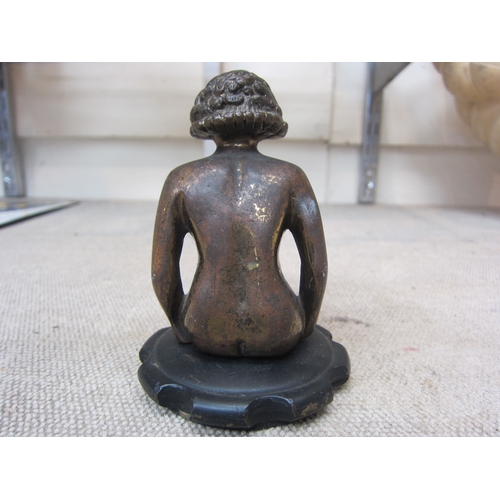 9274 - A bronze car radiator mascot circa 1900-1930, in the form of a seated naked lady