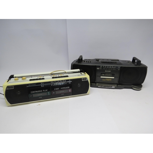 7393 - Two Sharp portable radio cassette players (2)