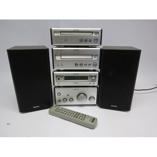 7371 - A Sony midi hifi system comprising TA-SP55 integrated amplifier, ST-SP55 tuner, TC-SP55 cassette dec... 