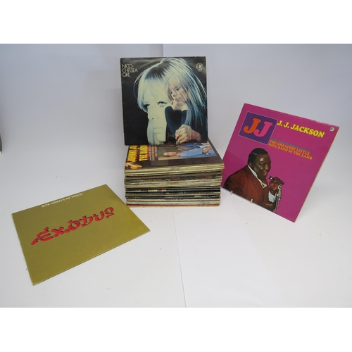 7099 - A box of mixed LPs including Nico, Stevie Wonder, Chuck Berry, The Beatles, Carl Perkins, Wings, Sla... 