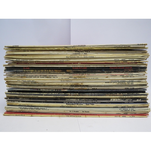 7099 - A box of mixed LPs including Nico, Stevie Wonder, Chuck Berry, The Beatles, Carl Perkins, Wings, Sla... 