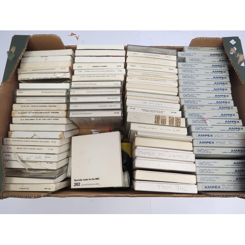 7389 - A box of assorted reel to reel tapes