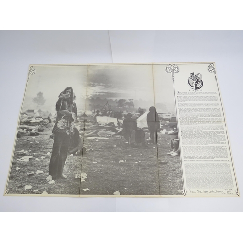 7117 - 'Glastonbury Fayre- The Electric Score' 1972 triple LP in fold out poster sleeve, no inserts or plas... 