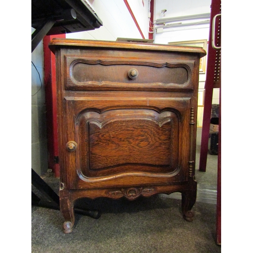 1063 - An oak pot cupboard, single drawer over cupboard door, 65cm tall x 53cm wide x 40cm deep