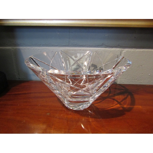 1072 - An Orrefors glass bowl with paper label and signed to base, fleabite chip to rim, 14.5cm tall x 26cm... 