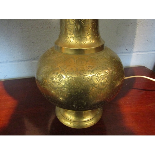 1075 - A pair of Indian brass table lamp bases with gold coloured pleated shades