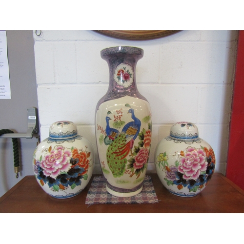 1079 - A pair of Chinese lidded ginger jars of large proportions 31cm tall, together with a Chinese vase of... 