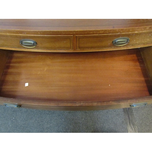 1080 - A Georgian style mahogany bow front chest of two short over three graduating long drawers, water dam... 