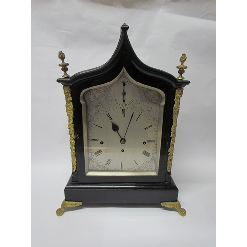 8071 - An 18th Century English ebonised bracket clock with cast brass feet, finials and side fret panels, s... 