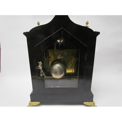 8071 - An 18th Century English ebonised bracket clock with cast brass feet, finials and side fret panels, s... 