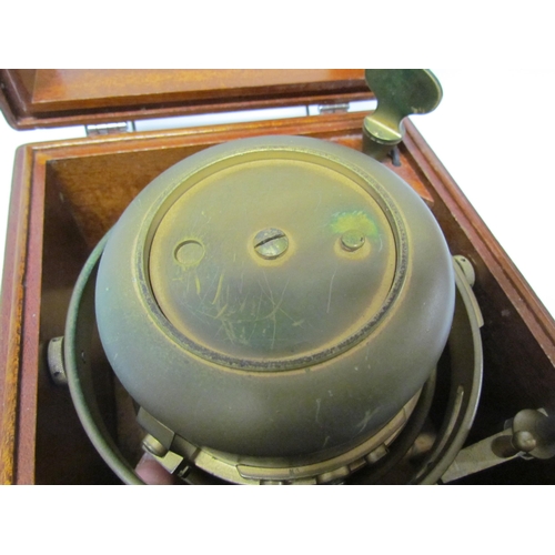 8079 - An early 20th Century marine chronometer by Thomas Mercer Ltd. , silvered Roman dial in brass gimbal... 