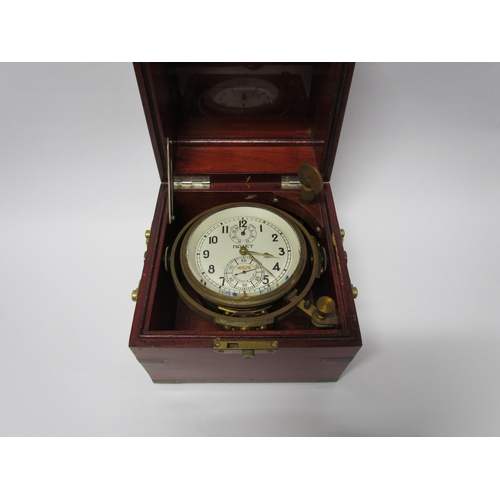 8080 - A 20th Century Russian marine chronometer mounted in brass gimbal frame and campaign style box, silv... 